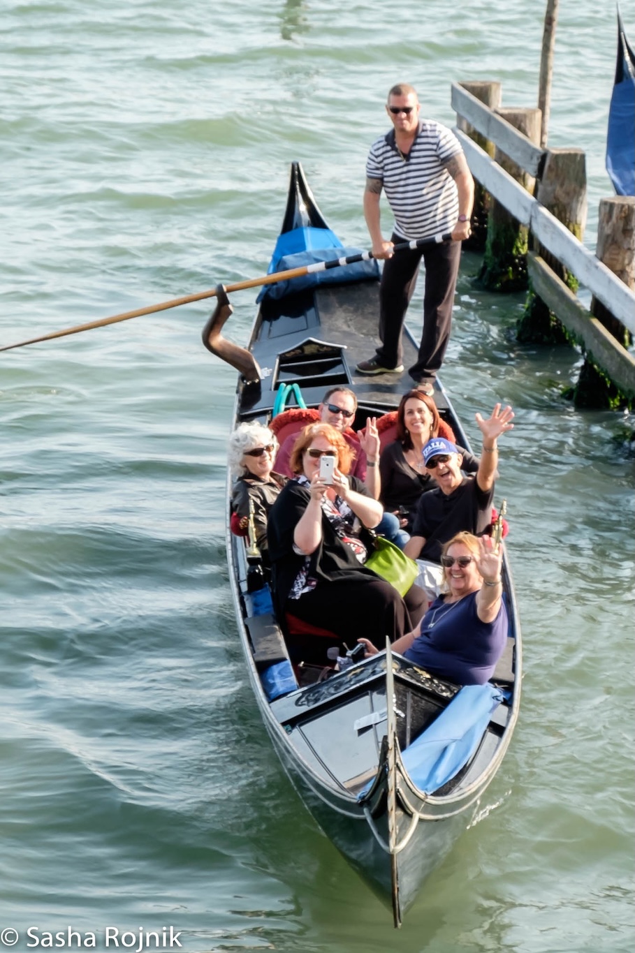 Guests on gondola, Venice